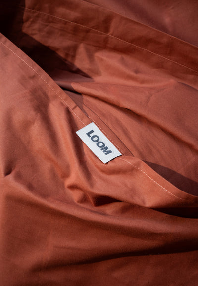 drap housse coton bio loom terracotta détail étiquette