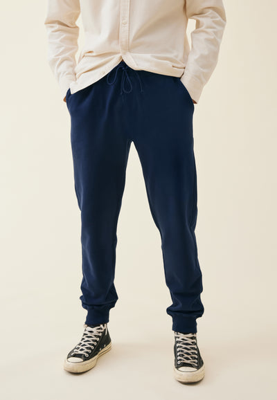 jogging coton bio loom bleu marine jambes main