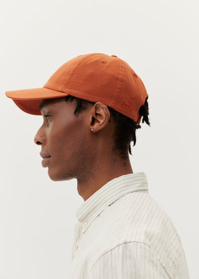 casquette orange loom profil détail logo